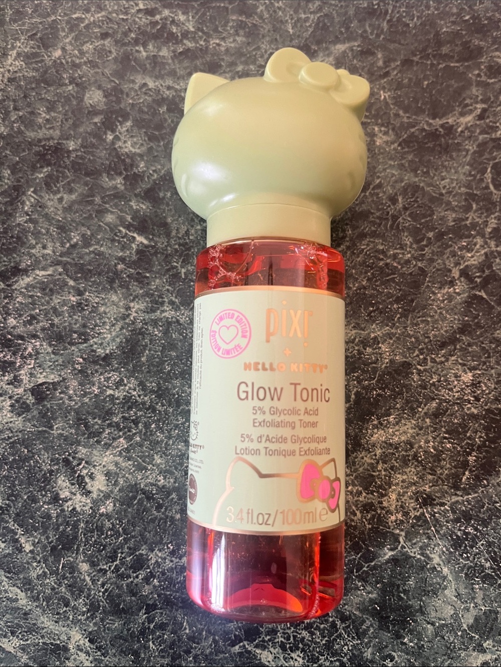 Pixi Glow Tonic — Pink Liquid with Mint Green Hello Kitty Cap